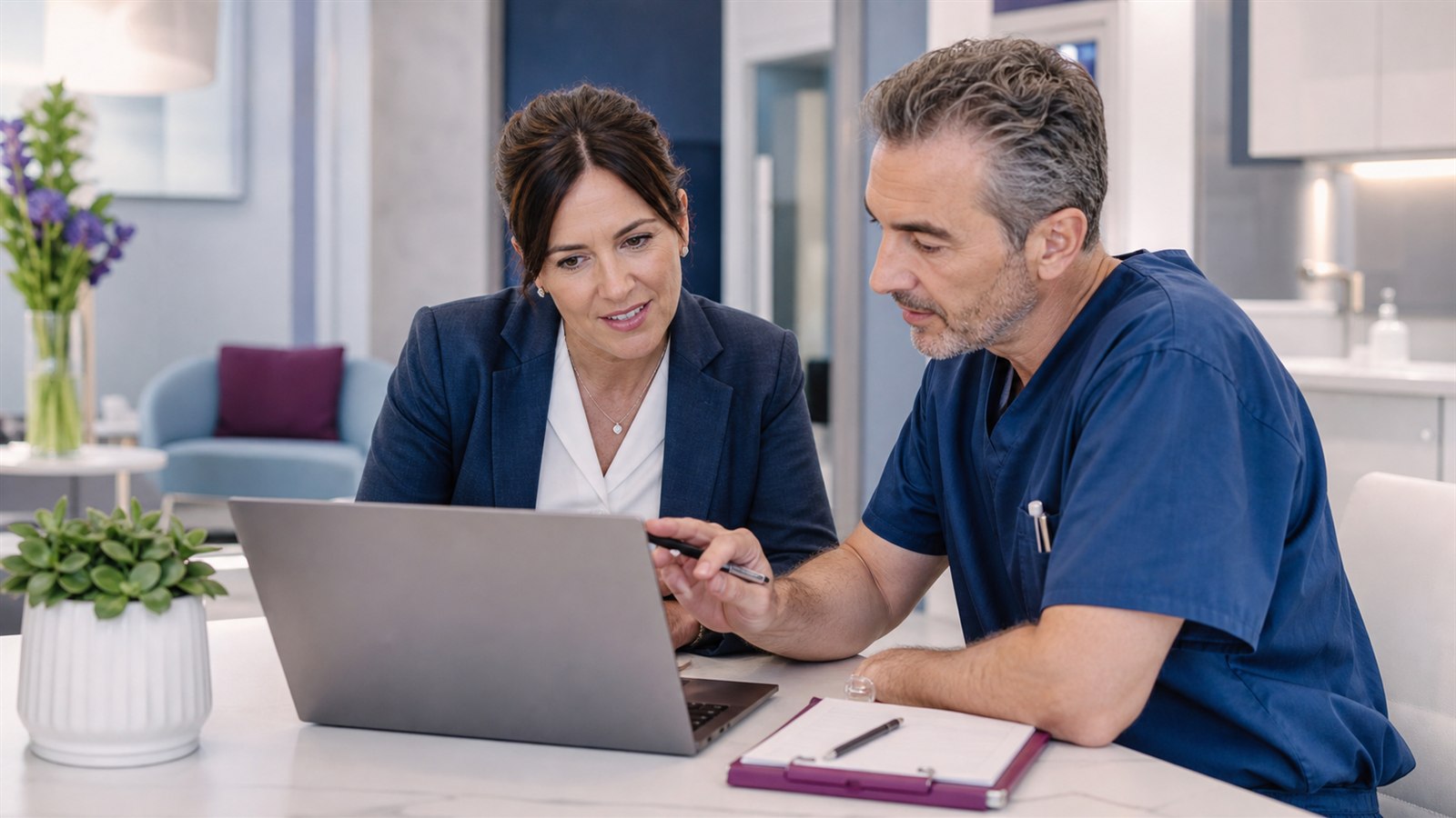 Clinic manager and practitioner reviewing ethical digital marketing in a UK clinic